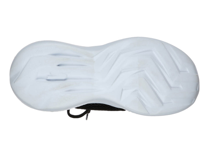 Tenis deportivos Skechers para niño en color negro con suela blanca.