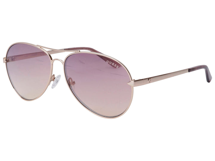 Lentes de sol Guess para mujer con montura metálica dorada y cristales degradados en tonos morados.