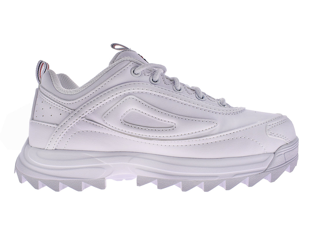 Tenis FILA Distorter en color blanco con suela gruesa y dentada, diseño deportivo moderno.