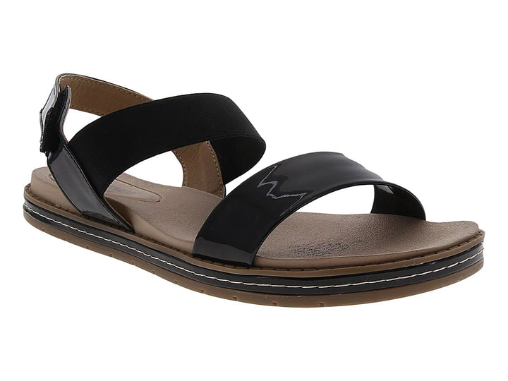 Sandalias negras de charol para mujer con suela marrón y correas cruzadas.