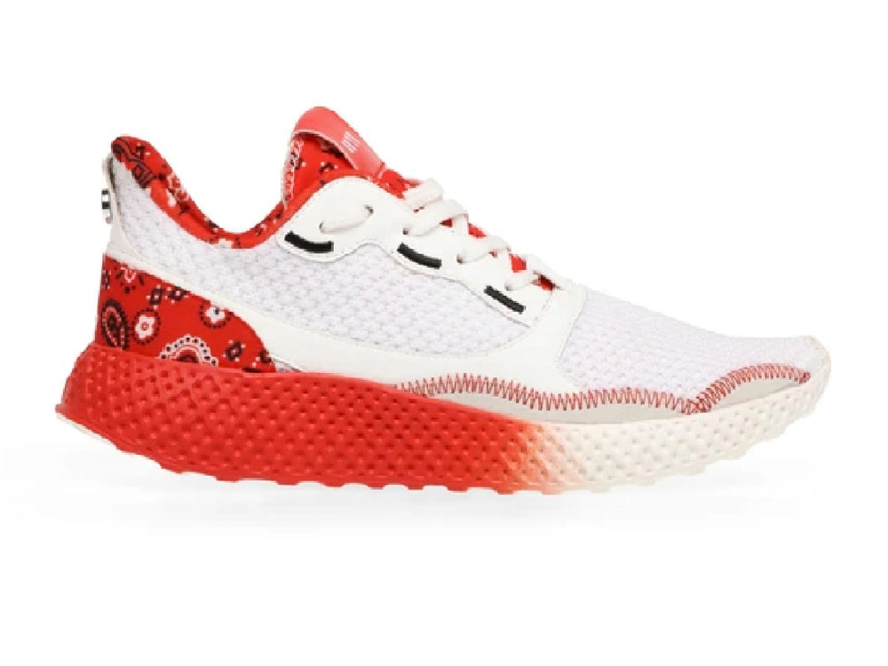 Tenis deportivos Steve Madden blancos y rojos con suela texturizada en degradado.
