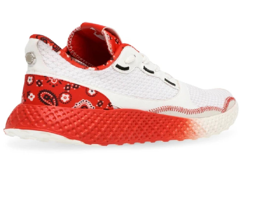 Tenis deportivos Steve Madden blancos y rojos con suela texturizada en degradado.