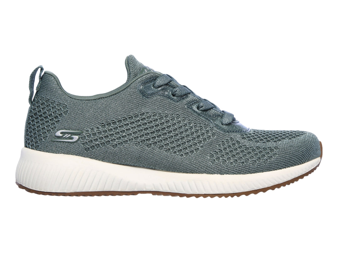 Tenis Skechers BOBS para mujer en color verde con suela blanca y base café.