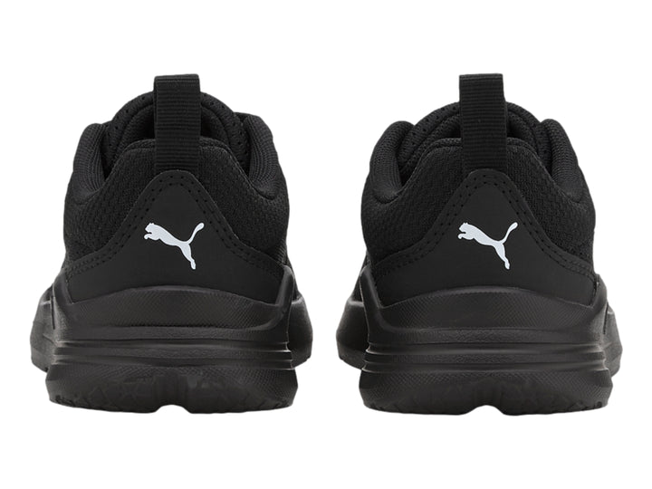 Tenis PUMA Wired Run JR color negro con malla transpirable y suela deportiva.