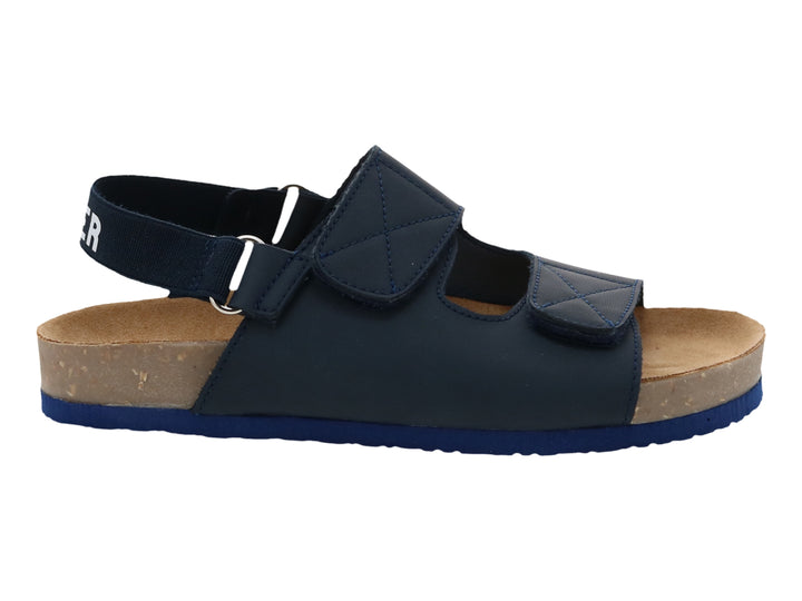 Sandalias para niño color azul marino con suela de corcho y correas ajustables.
