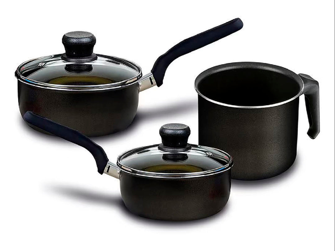 Batería de cocina T-FAL de 11 piezas en color negro con tapas de vidrio y mangos negros.