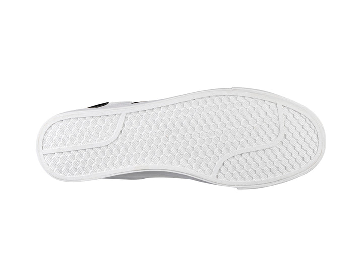 Tenis K-Swiss blancos para mujer con rayas negras diagonales en el lateral y suela blanca.