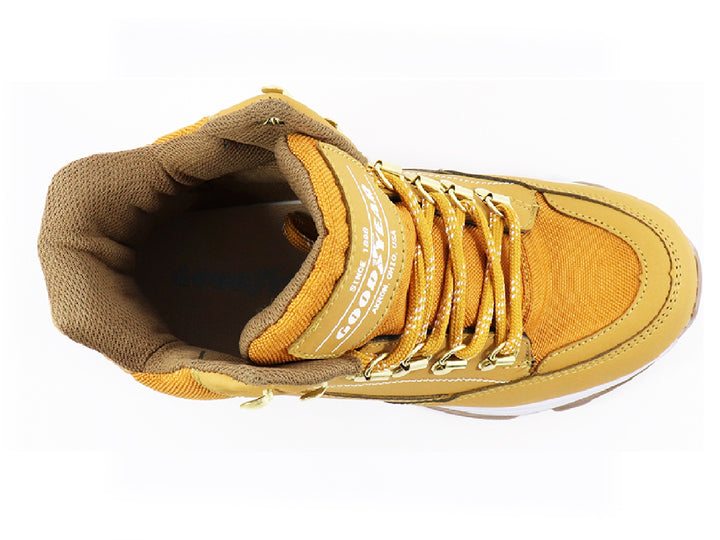 Botas Goodyear color miel para mujer con suela blanca y cordones.