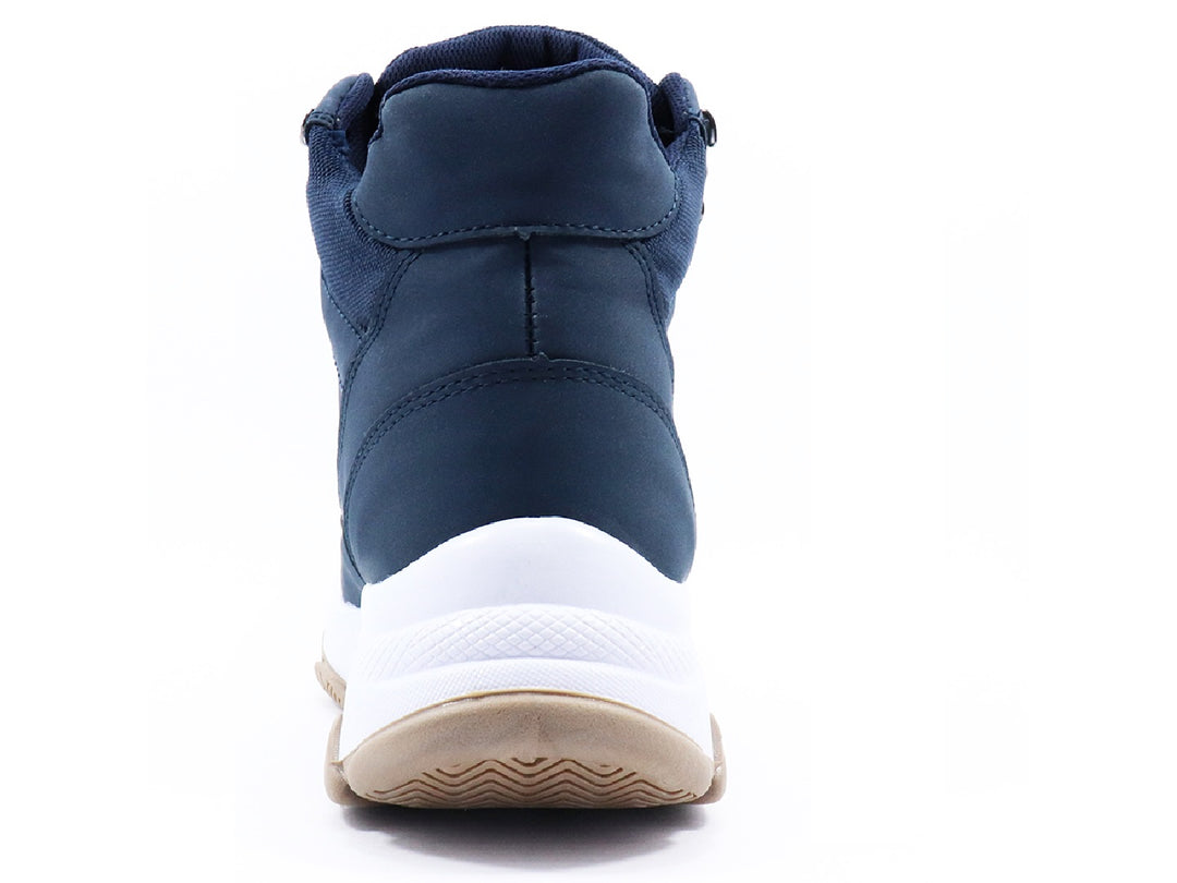 Botas Goodyear color azul denim con suela blanca y beige para mujer.