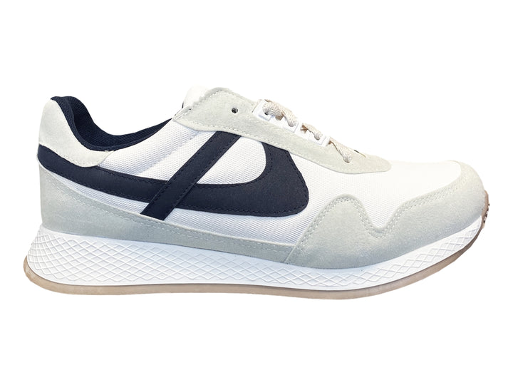 Tenis para niño PANAM color blanco y azul con detalles en gris y suela beige.