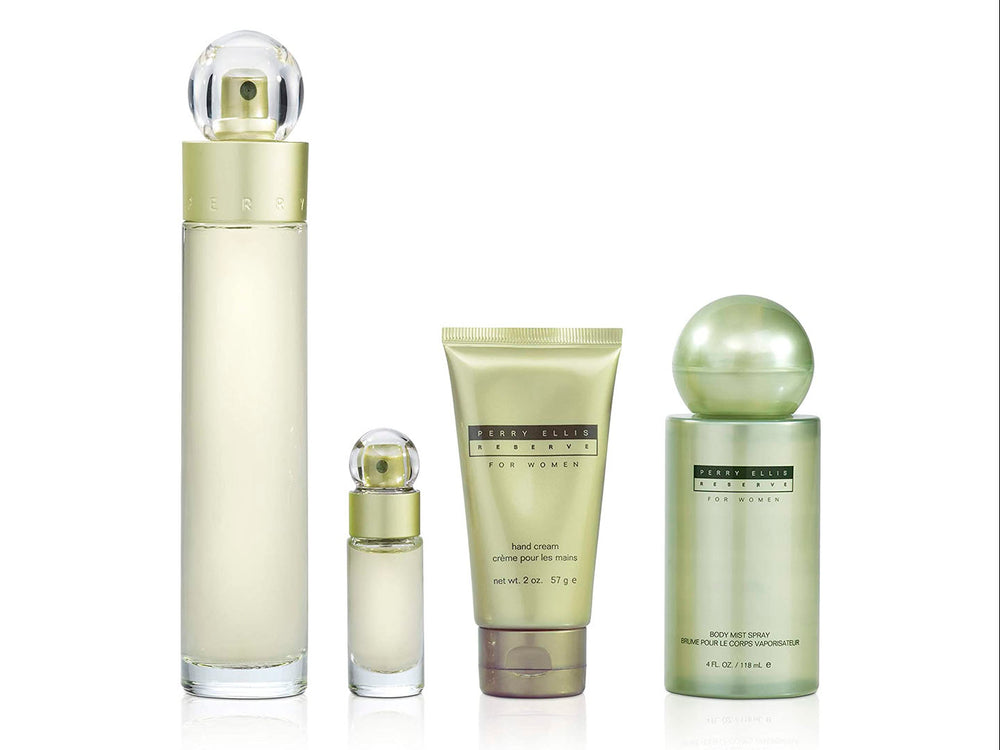 Set de perfume Perry Ellis Reserve para mujer en color dorado pálido con tres productos y caja decorada.