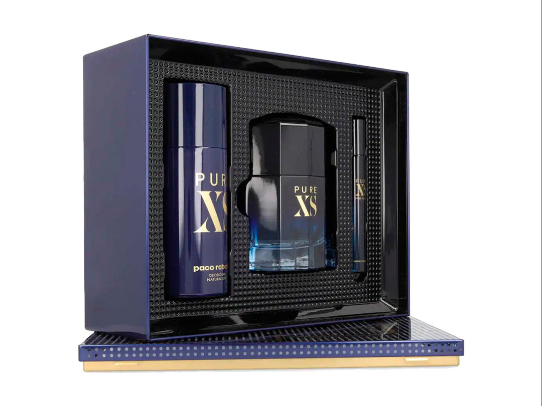 Set de perfume Paco Rabanne Pure XS en estuche azul marino con tres piezas: fragancia, desodorante y spray.