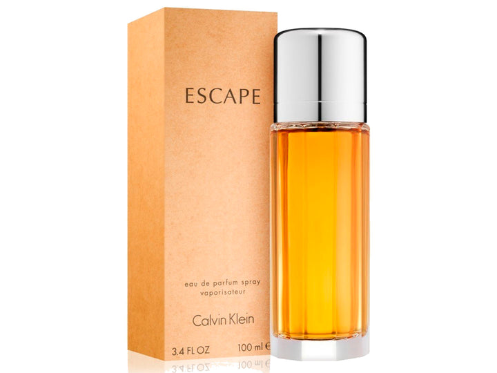 Perfume Calvin Klein Escape para Mujer, botella cilíndrica con líquido dorado y tapa plateada junto a su caja beige.