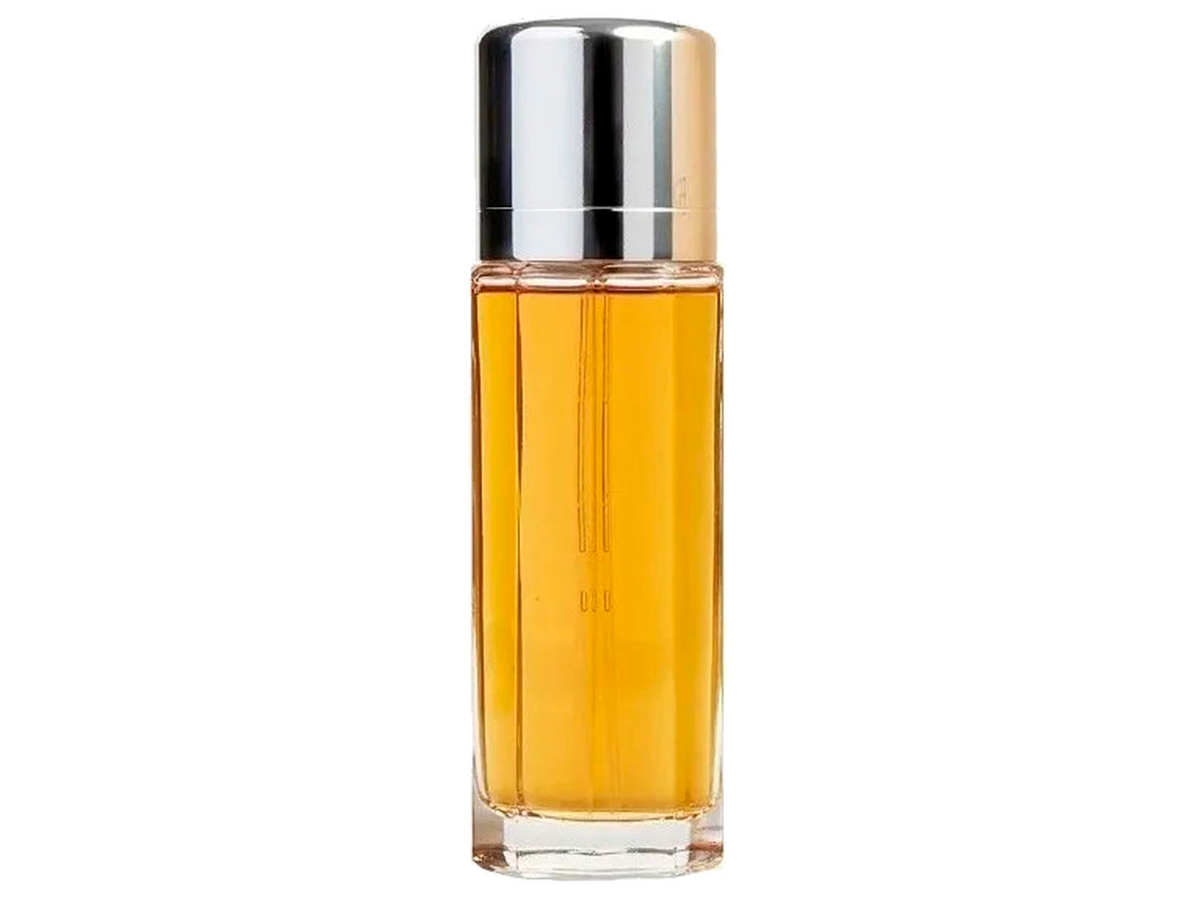 Perfume Calvin Klein Escape para Mujer, botella cilíndrica con líquido dorado y tapa plateada junto a su caja beige.