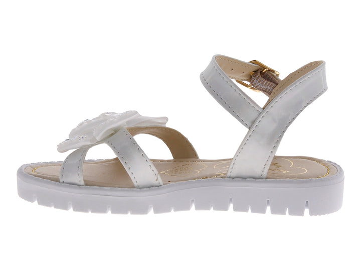 Sandalias blancas para niña con moño decorativo y acabado brillante.