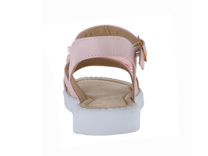 Sandalia infantil color rosa con moño brillante, hebilla dorada y suela blanca.
