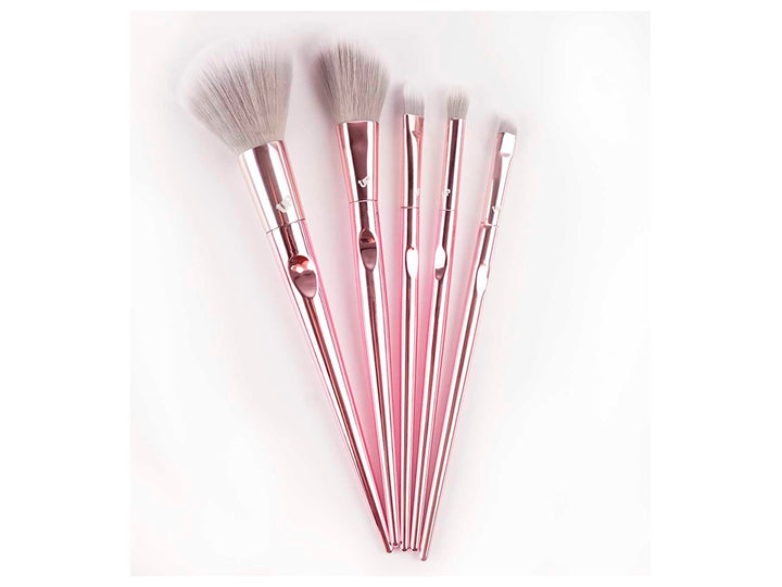 Set de 5 brochas de maquillaje Pink Up con mangos color oro rosa en empaque rosa.