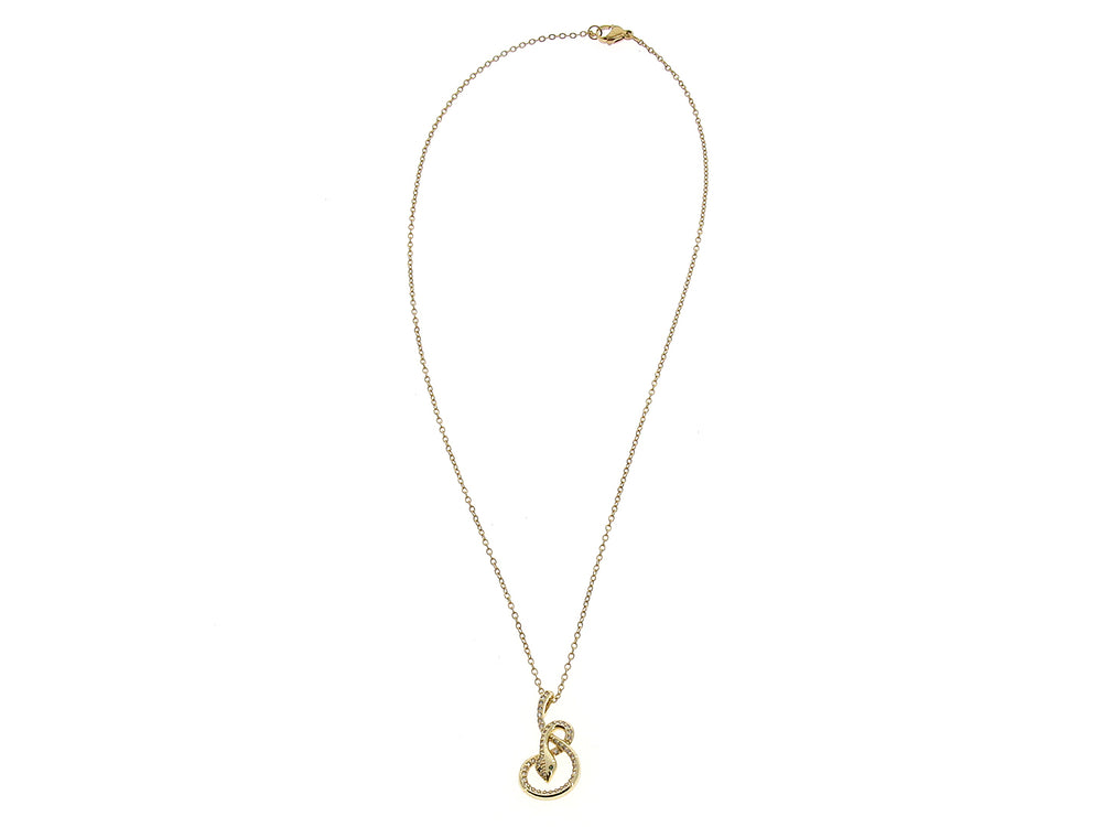 Collar de oro con dije en forma de espiral adornado con pequeñas piedras brillantes.