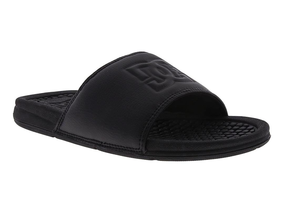 Sandalias tipo slide color negro de la marca DC Shoes con suela texturizada.