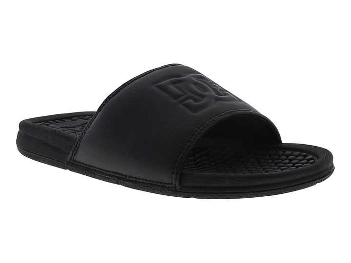Sandalias tipo slide color negro de la marca DC Shoes con suela texturizada.