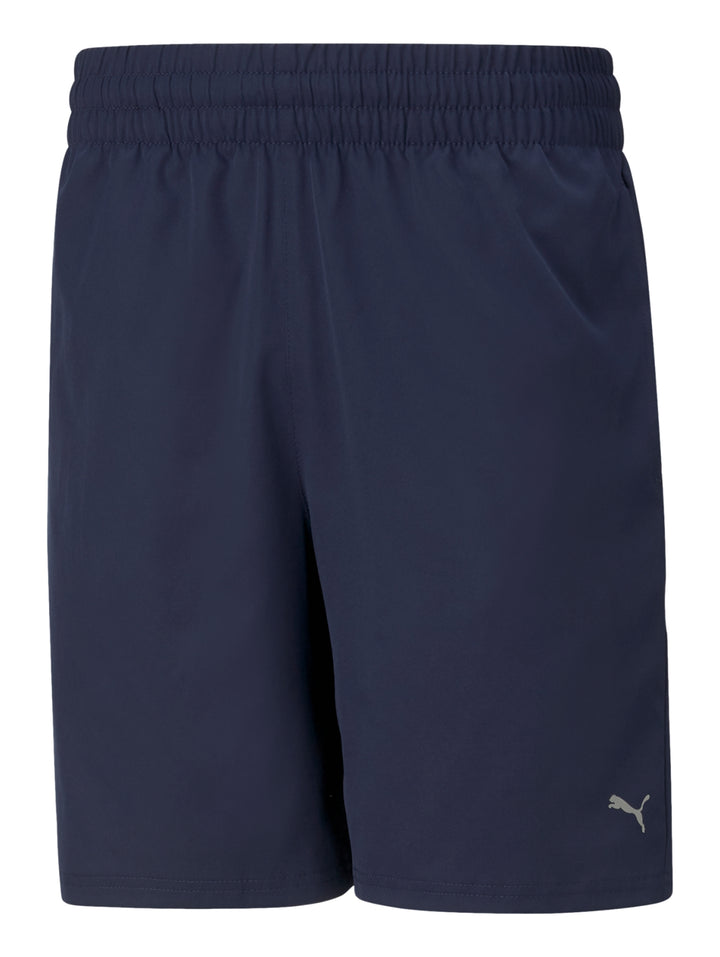 Shorts deportivos PUMA en color azul marino con cintura elástica y logotipo lateral.
