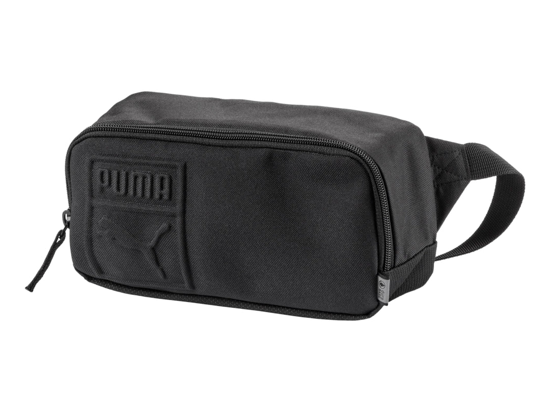 Riñonera PUMA color negro con logotipo en relieve y cierre superior.