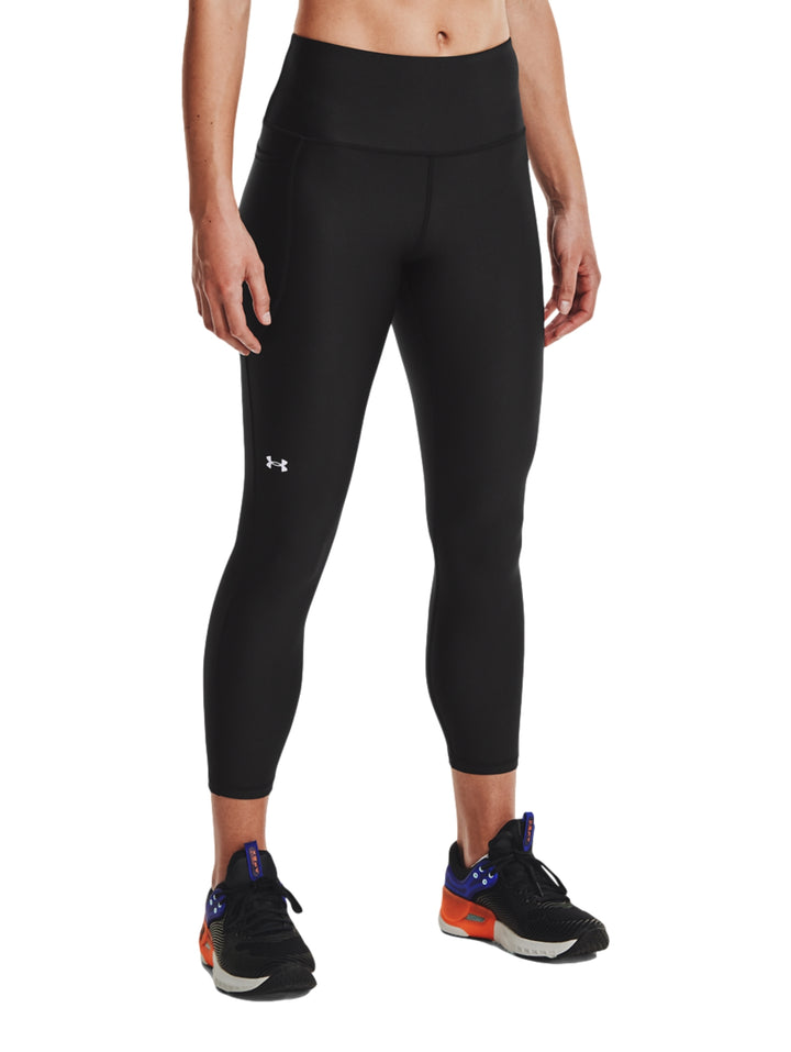 Mallas deportivas negras Under Armour para mujer con corte al tobillo.