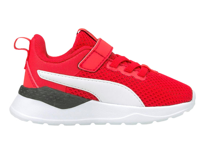 Tenis PUMA infantiles color rojo con detalles en blanco y suela blanca.