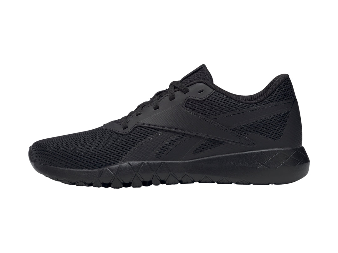 Tenis Reebok Flexagon Energy TR en color negro total, con malla transpirable y suela deportiva.