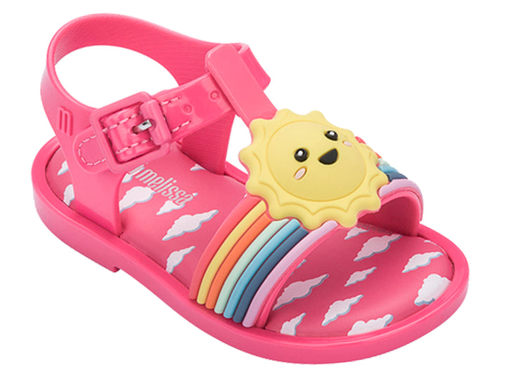 Sandalia rosa para niña de Mini Melissa con diseño de sol, arcoíris y nubes blancas.