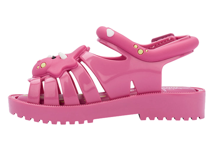 Sandalia infantil de plástico color rosa con detalle decorativo frontal y correas ajustables.