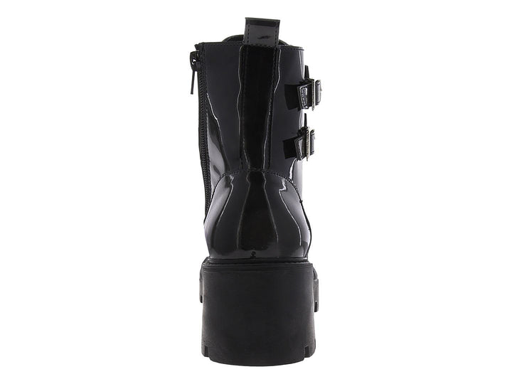 Bota militar para mujer de charol negro con plataforma y hebillas plateadas.