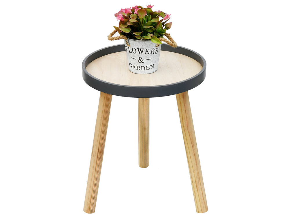 Mesa de centro circular de madera clara con borde gris y tres patas cónicas.