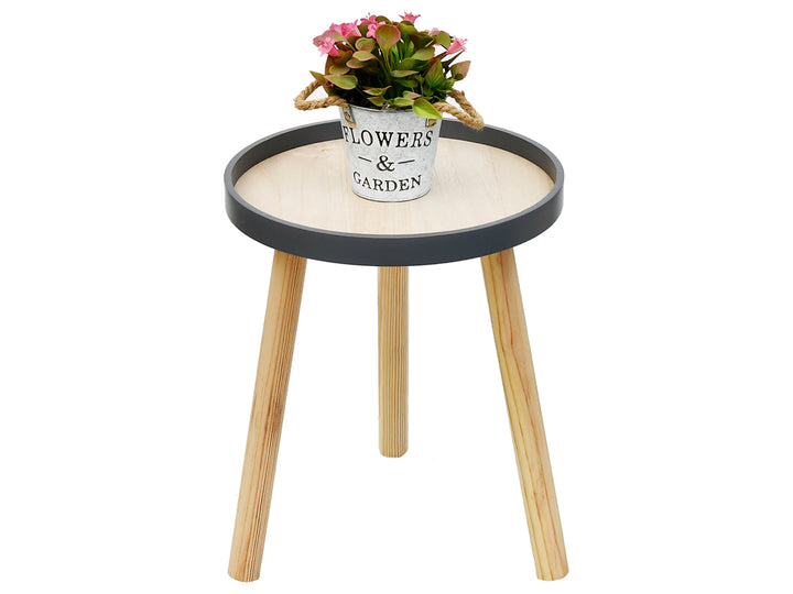 Mesa de centro circular de madera clara con borde gris y tres patas cónicas.