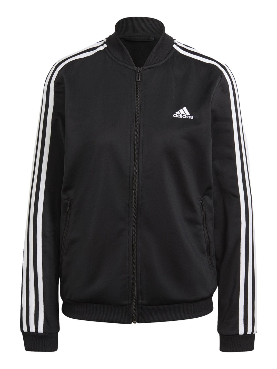 Conjunto deportivo Adidas negro para mujer con rayas blancas laterales y calzado blanco.