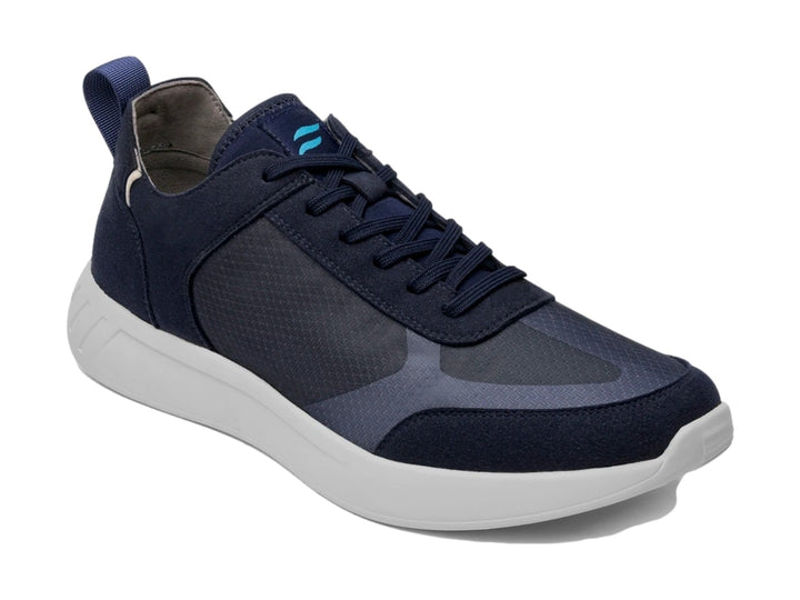 Tenis Flexi Forseti para hombre en color azul con suela blanca y detalles en gamuza.