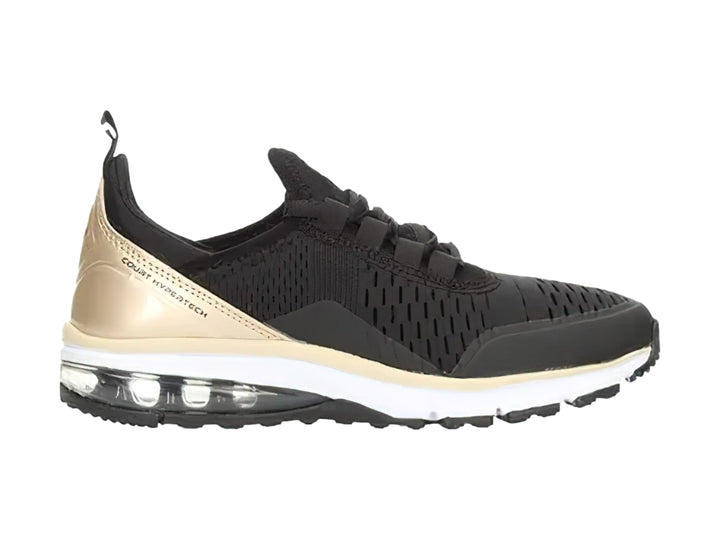 Tenis deportivos color negro con detalles en oro y suela blanca con amortiguación de aire.