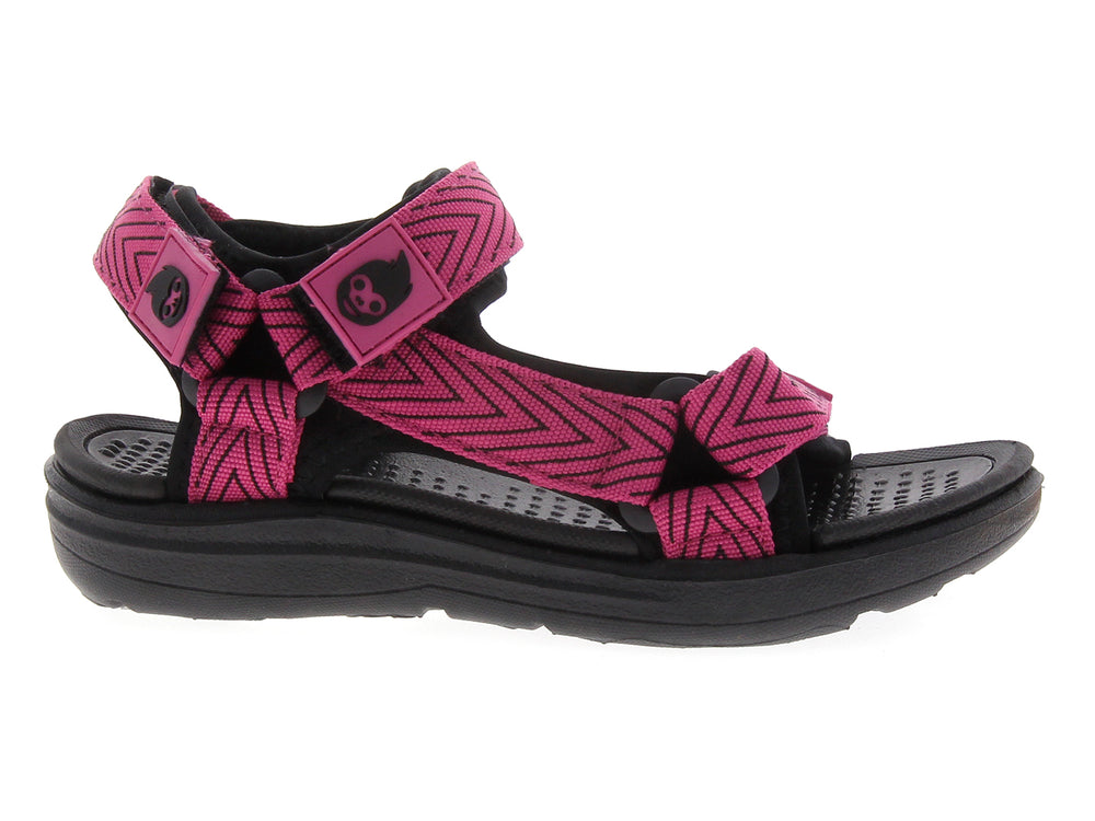Sandalia para niña color rosa fucsia con suela negra y diseño tipo gladiador.