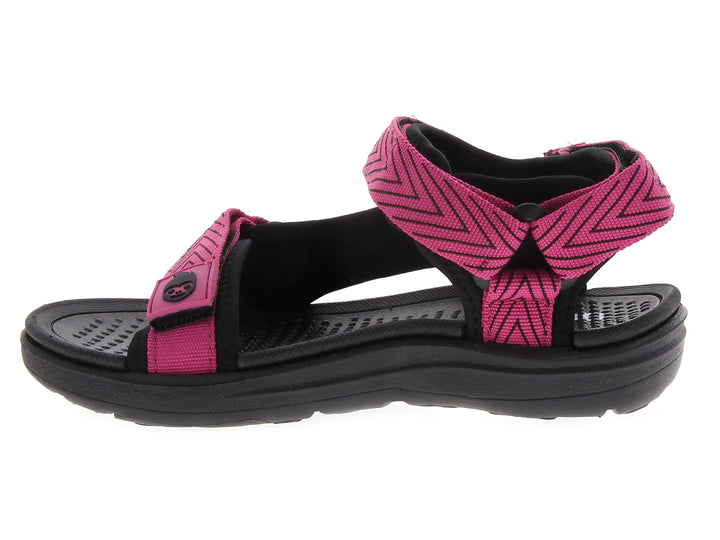 Sandalia gladiador para mujer en color rosa fuscia con suela negra.