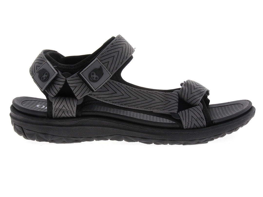 Sandalia gladiador para niño en color gris con tiras texturizadas y cierre de velcro.