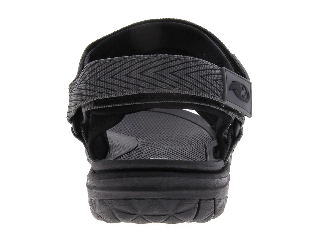 Sandalia gladiador para niño en color gris con tiras texturizadas y cierre de velcro.