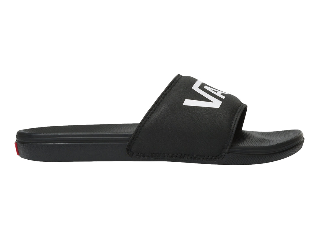 Sandalia VANS La Costa Slide-On en color negro con logotipo blanco en la banda superior.