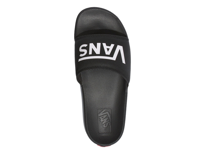 Sandalia VANS La Costa Slide-On en color negro con logotipo blanco en la banda superior.