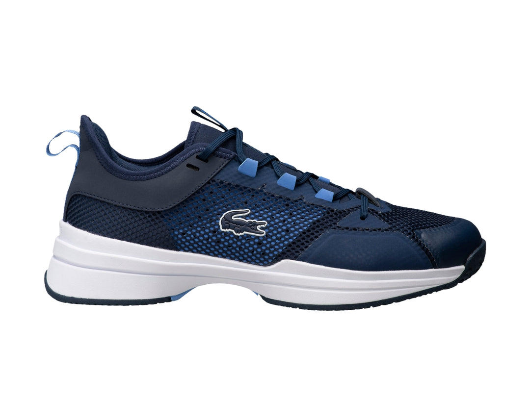 Tenis deportivos Lacoste color azul marino y azul con suela blanca para hombre.