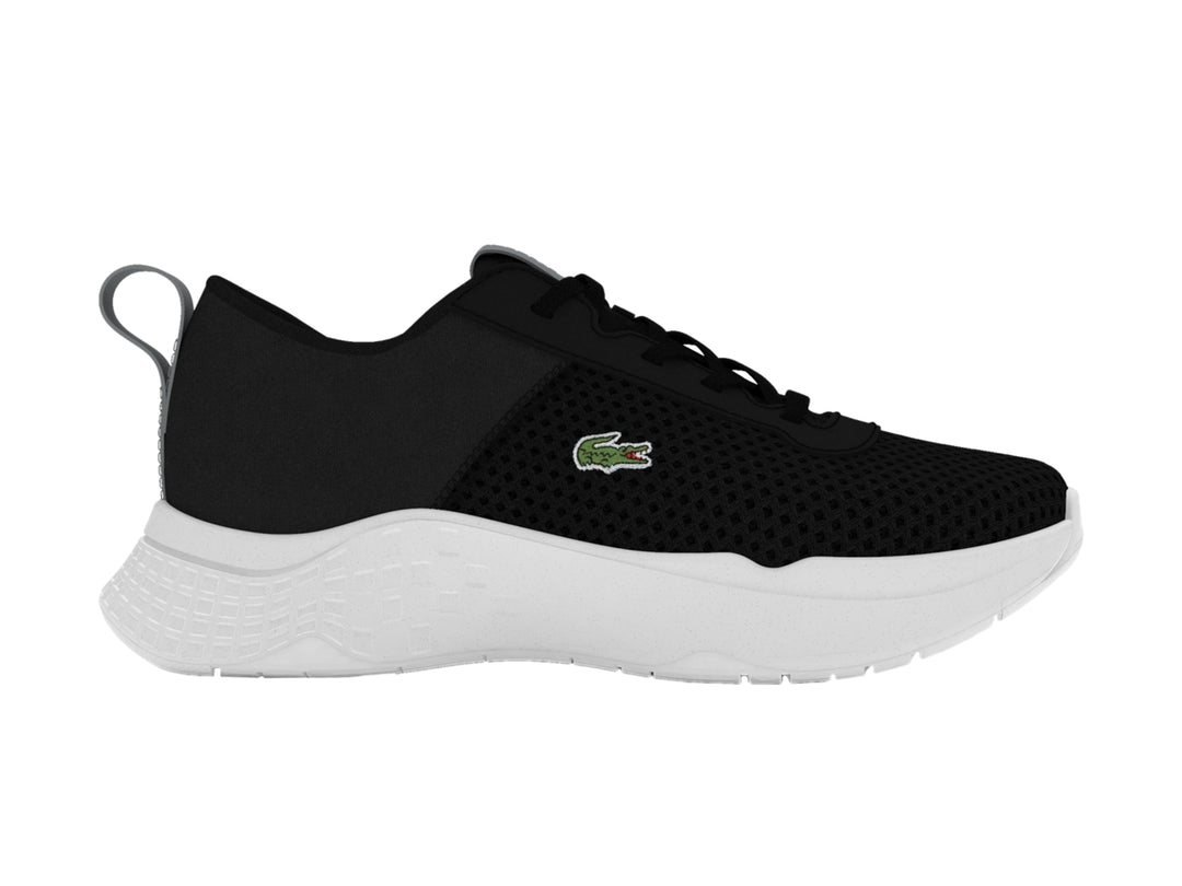 Tenis deportivos Lacoste para niño en color negro con suela blanca.