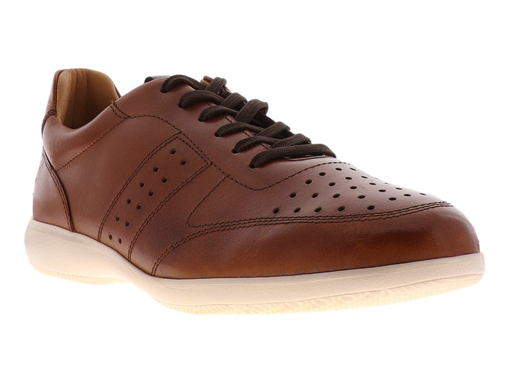Zapato casual de cuero marrón con cordones y suela blanca.