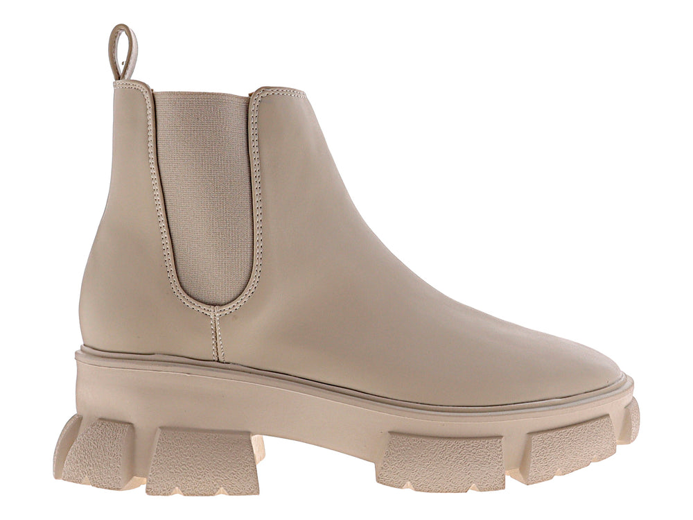Bota combat color nude para mujer con suela de plataforma gruesa y acabado mate.