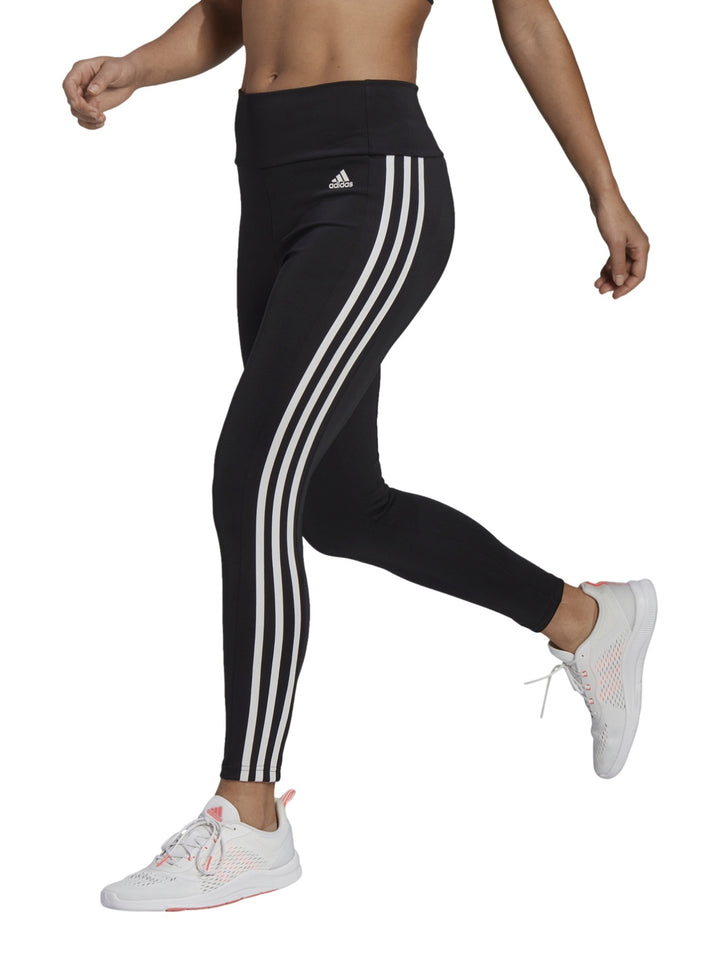 Mallas deportivas Adidas negras con tres franjas blancas laterales para mujer.