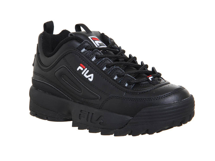 Tenis FILA Disruptor II Premium en color negro con suela robusta y dentada para niños.