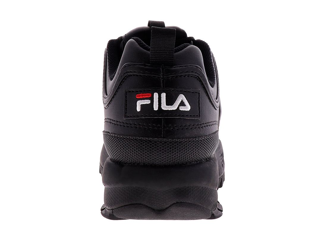Tenis FILA Disruptor II Premium en color negro con suela robusta y dentada para niños.